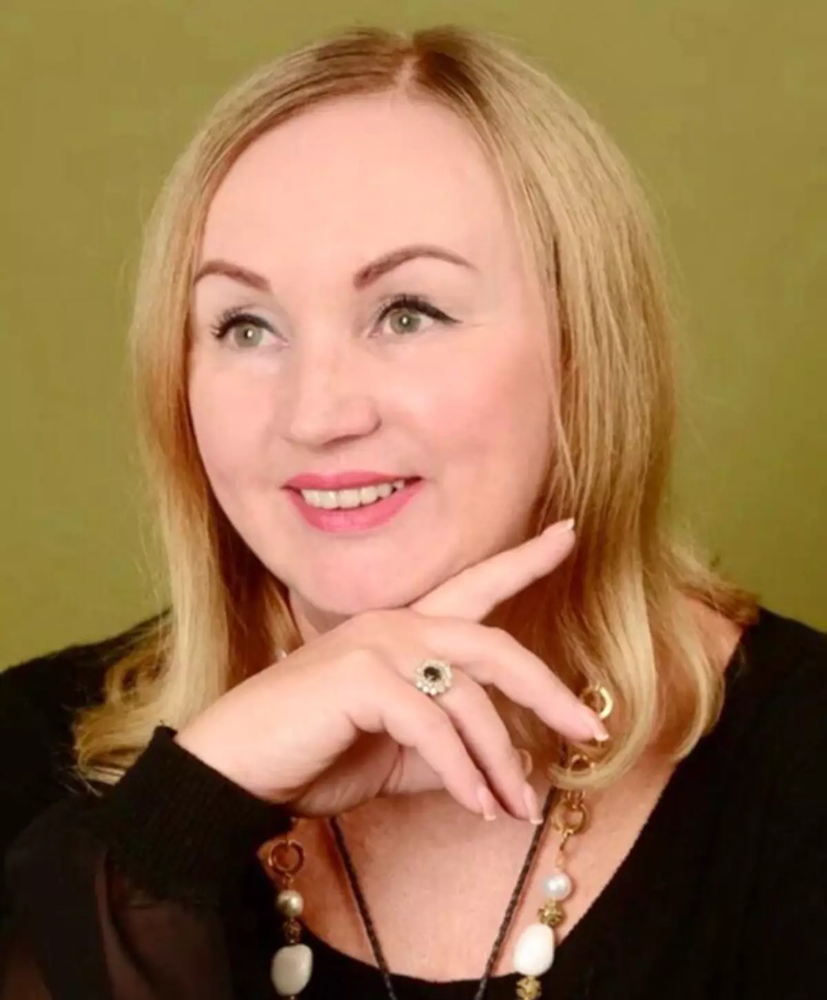 Олга Романија.