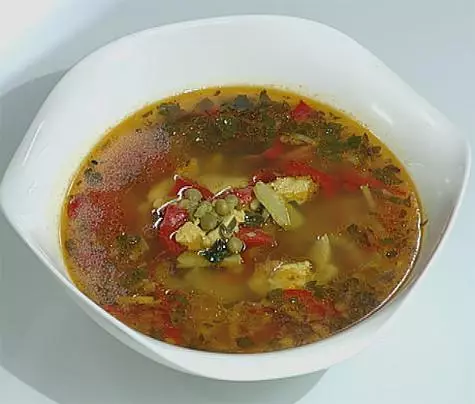 Soup with spicy chicken and vegetables. .
