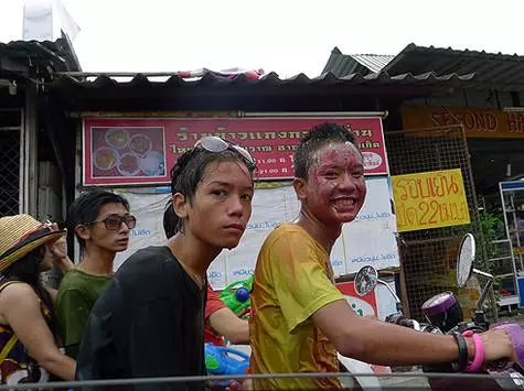 In Songkran, it is also customary to smear all the surrounding colored clay or talc.