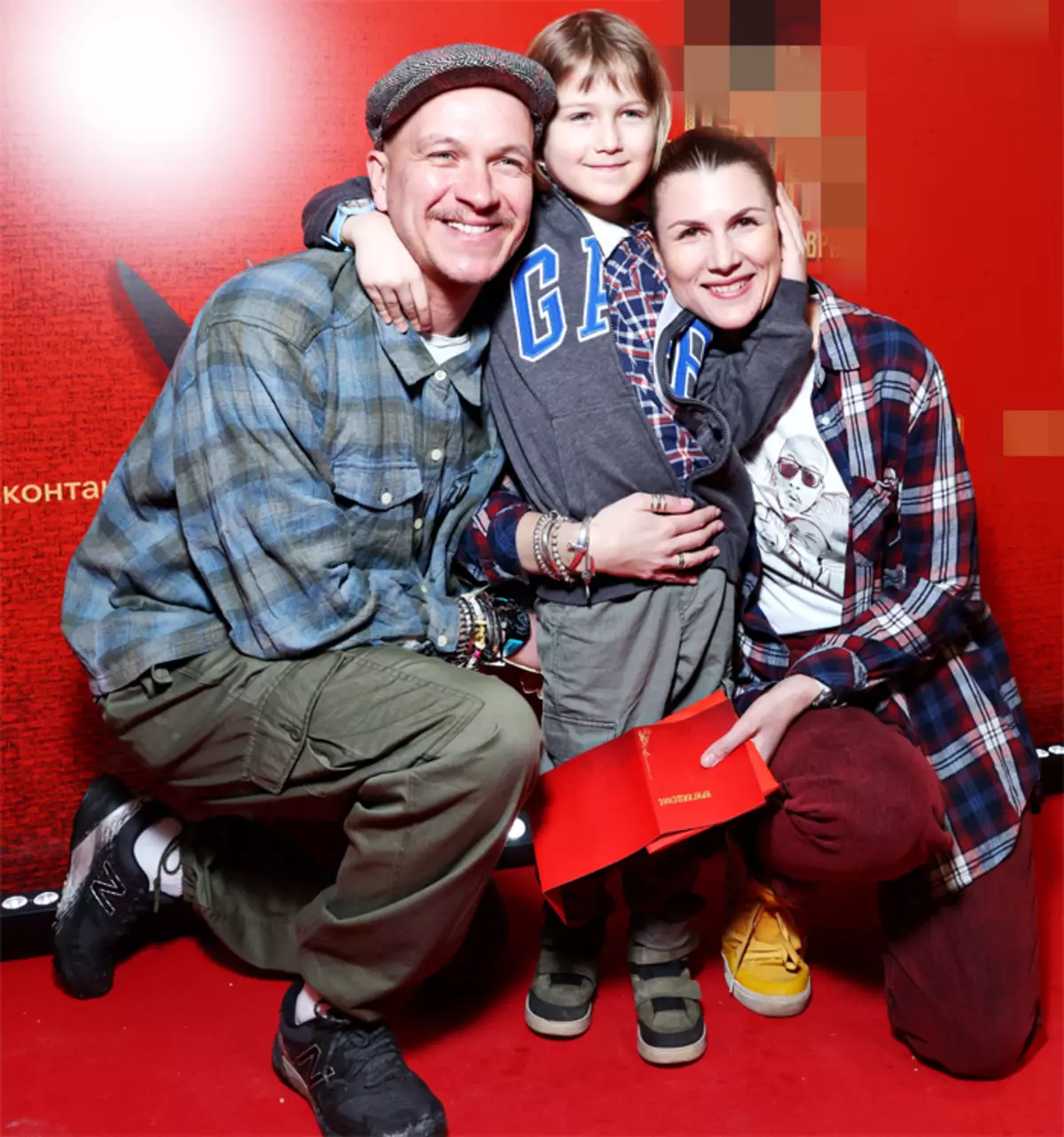 Mariana Spivak ar savu vīru un dēlu Grisha